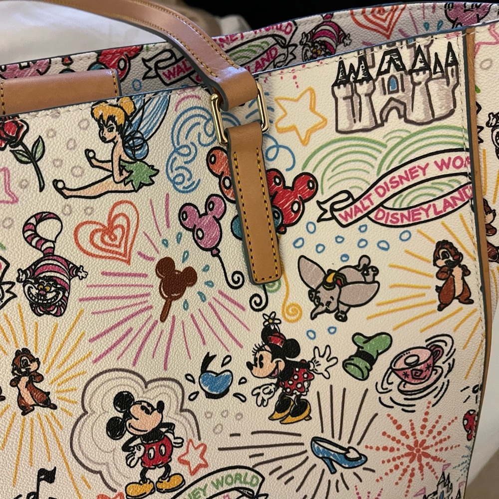 Disney Cream Canvas Tote with Multi-Color Character Print and Tan Handles